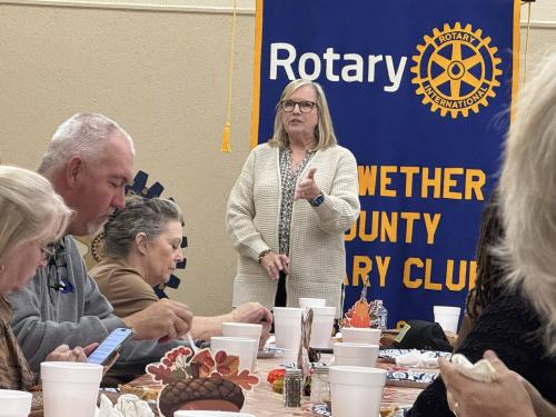Beth Hadley speaks to club about Operation Good Neighbor 11-18-2025.jpg