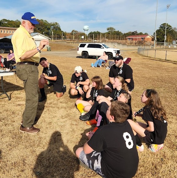 Students receive the Rotary 4 way test Middle School students.jpg