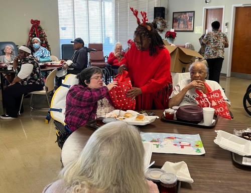 Stephanie Harris giving Gifts.jpeg