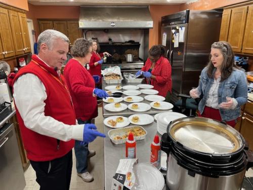 Al, Cynthia, Jo, Stephanie and Jodi preparing food.jpeg